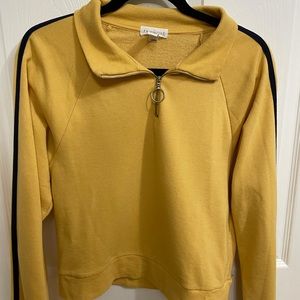 mustard yellow quarter zip with navy stripes on sleeves!!